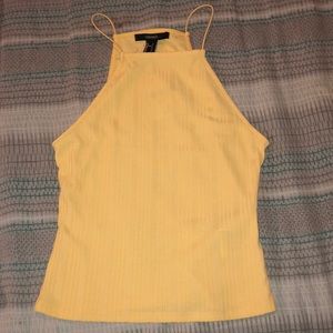 yellow sleeveless top